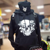 Skull with Mushrooms growing out of it white graphic on soft black hoodie